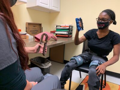 occupational therapy patient does hand workout